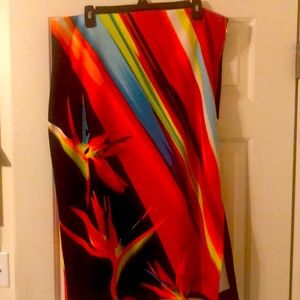 Bright, colorful skirt with side zip and side slit.